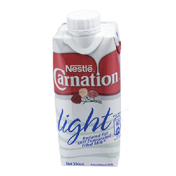 Nestle Milk Carnation Reduced Fat Evapor